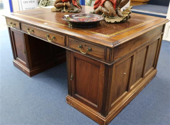 An Edwardian pedestal partners desk, W.168cm